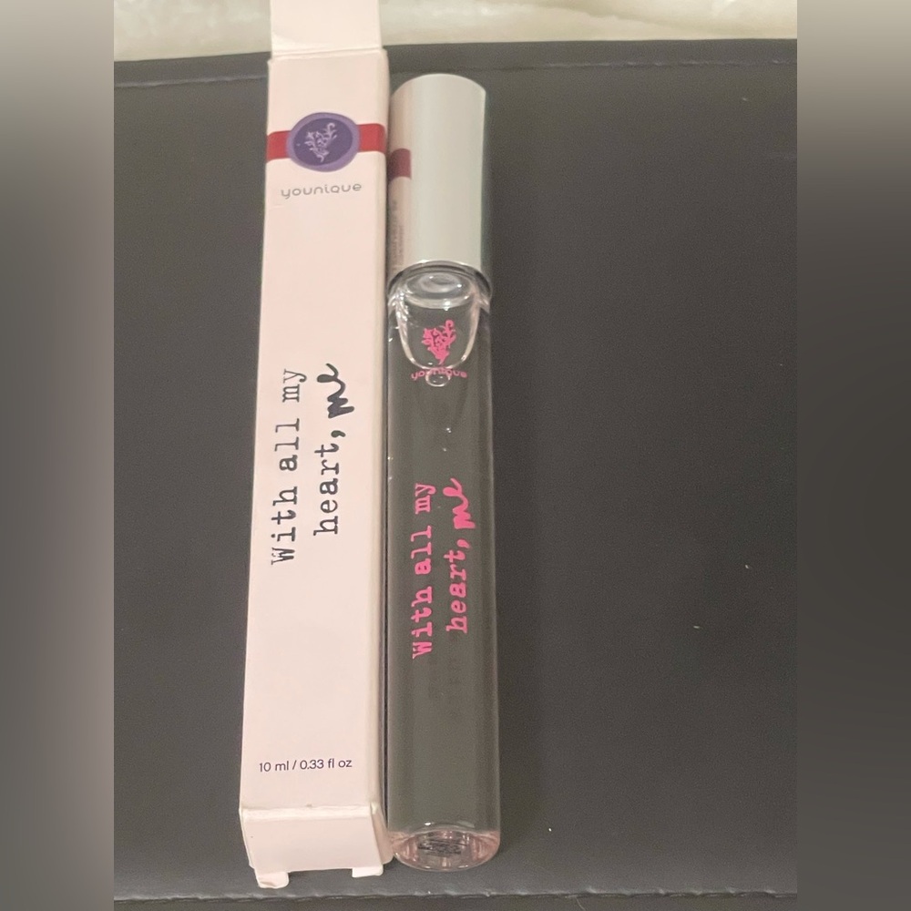 Younique Clear Lip Gloss with Pink Logo and Accents